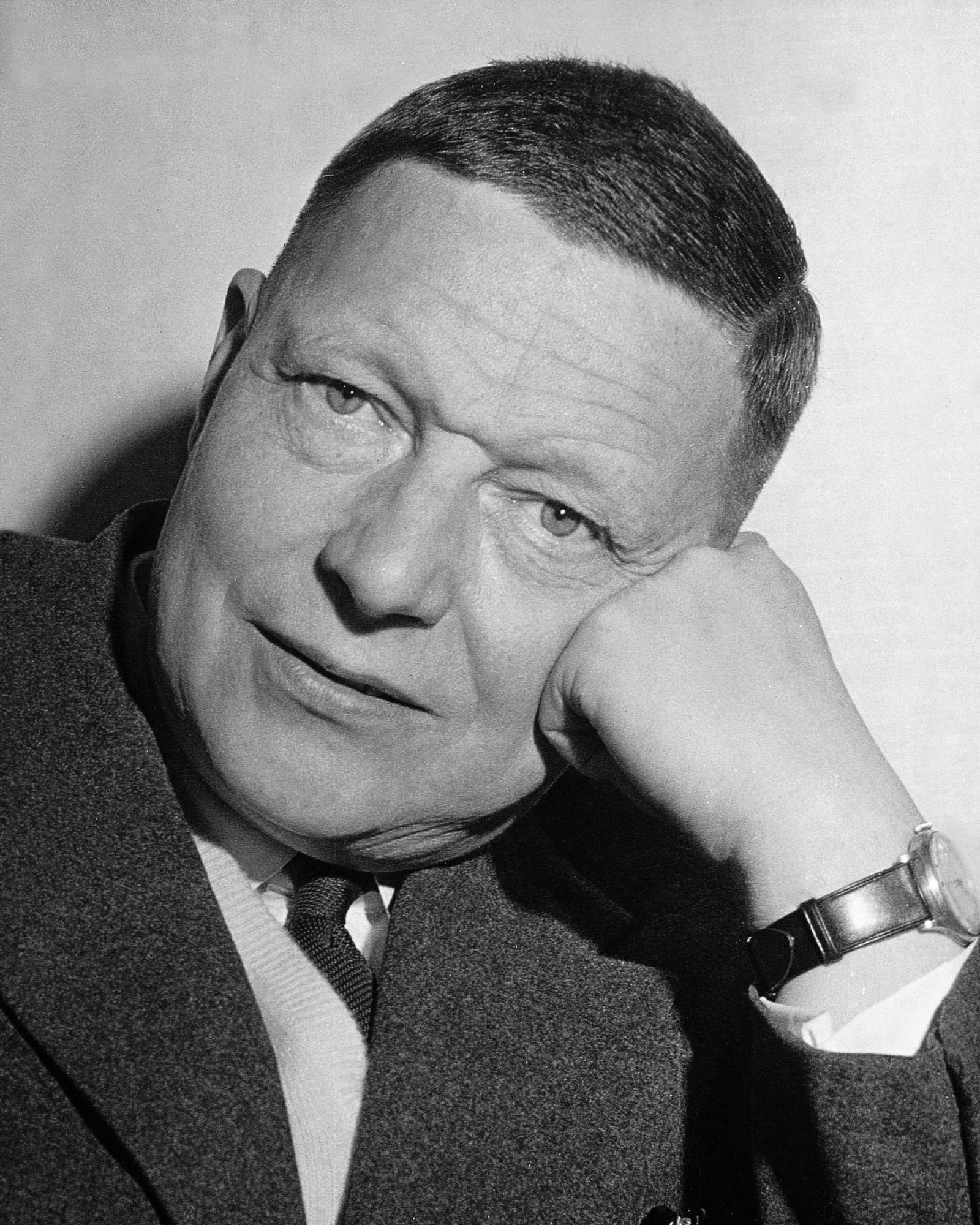 Portrait of designer Carl Pott, known for his minimalist and timeless design work, featured on the JANGEORGe Interiors & Furniture website.