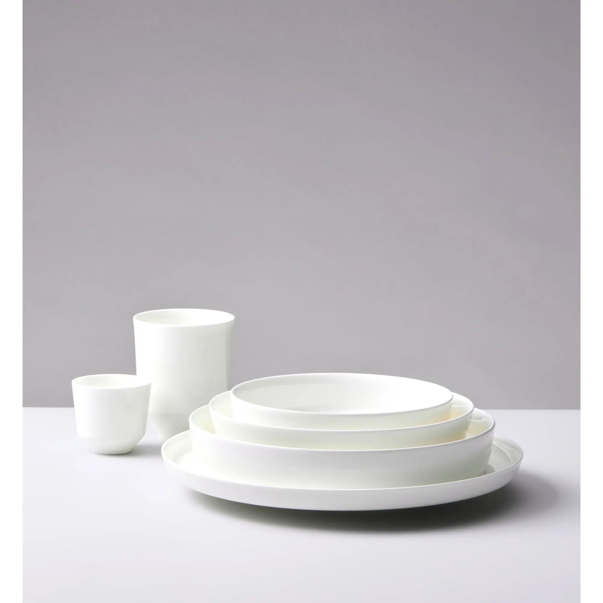 Dibbern Juno Salad Bowl, German fine bone china bowl with smooth white surface and modern silhouette.