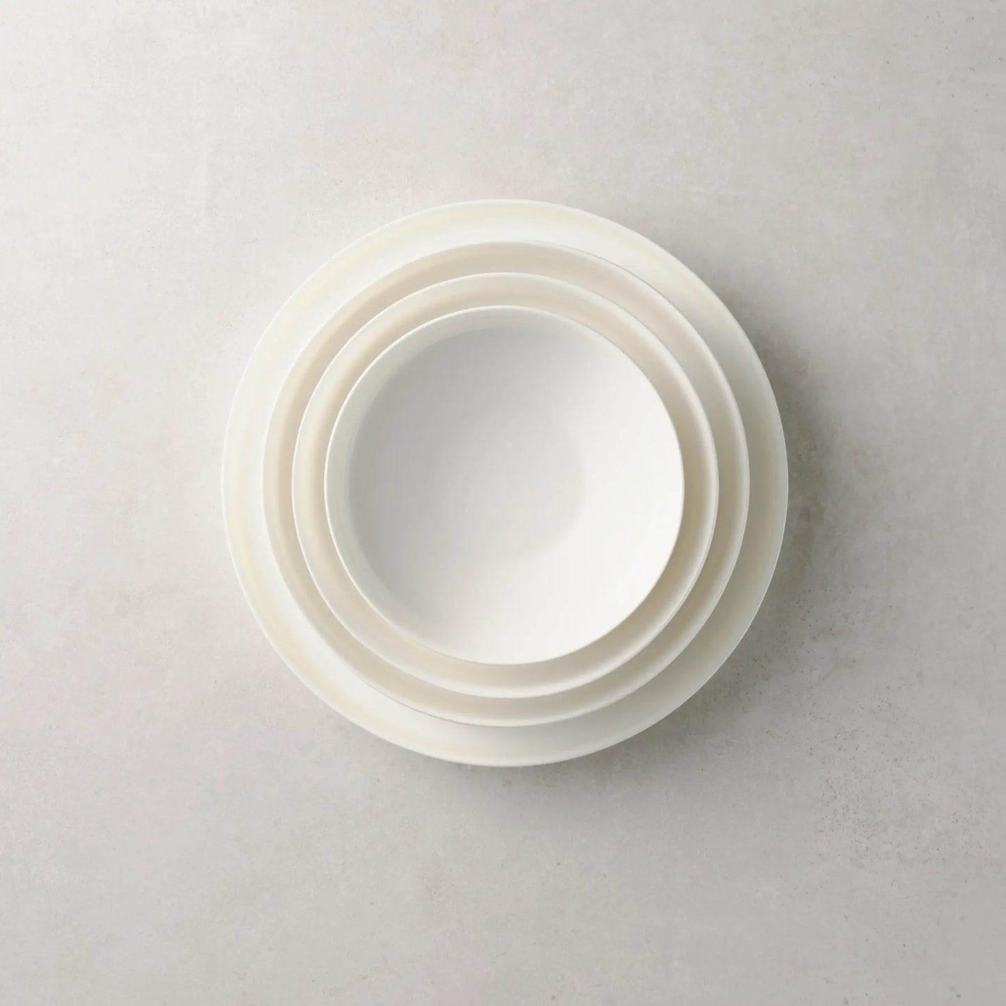 Dibbern Juno Salad Bowl, German fine bone china bowl with smooth white surface and modern silhouette.