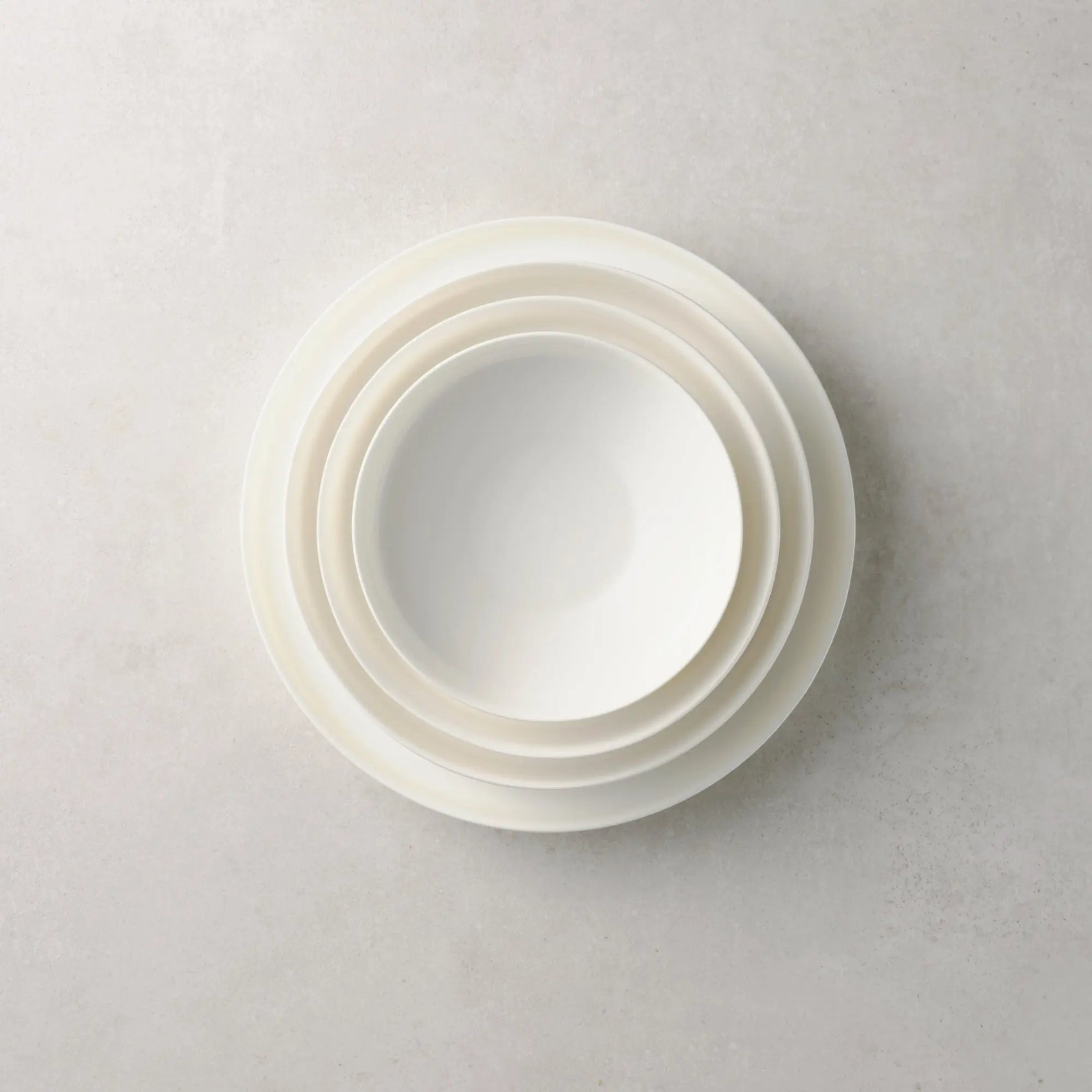 Dibbern Juno Salad Bowl, German fine bone china bowl with smooth white surface and modern silhouette.