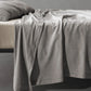 Society Limonta Smir flat sheet in Grano grey featuring a luxurious soft wash finish designed for winter comfort.