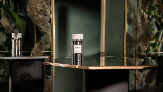 Cloon Keen Perfume - Luxury Irish Handcrafted Fragrance displayed on an elegant table in a lush setting.