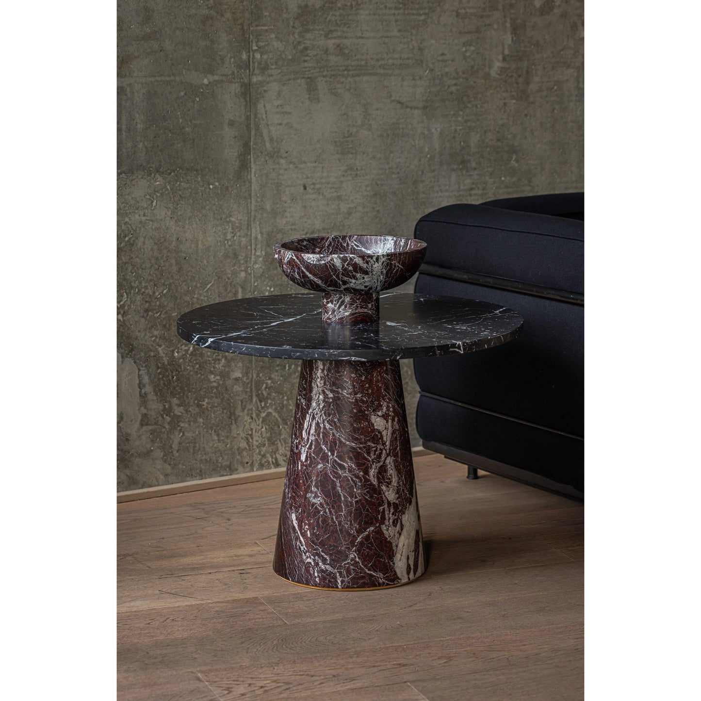 Inside Out - Table in marble showcasing versatile design with conical base and removable bowl top in modern living room setting