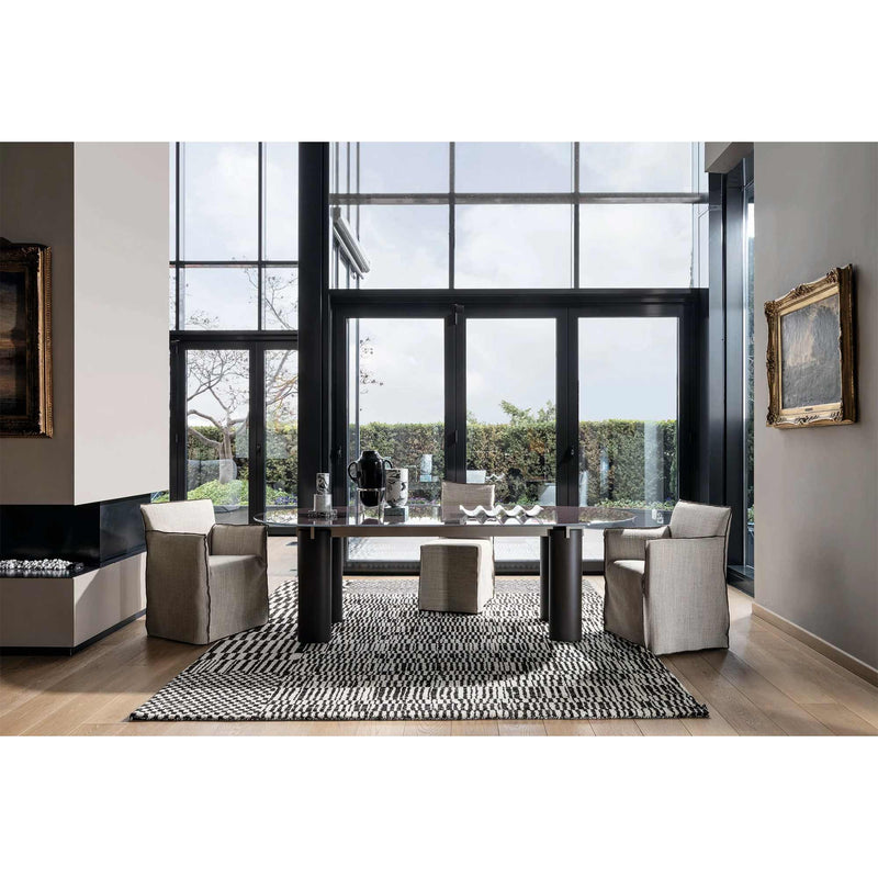 Gervasoni Daen 34 Oval Table in dining room in front of patio doors. Tables USA. 