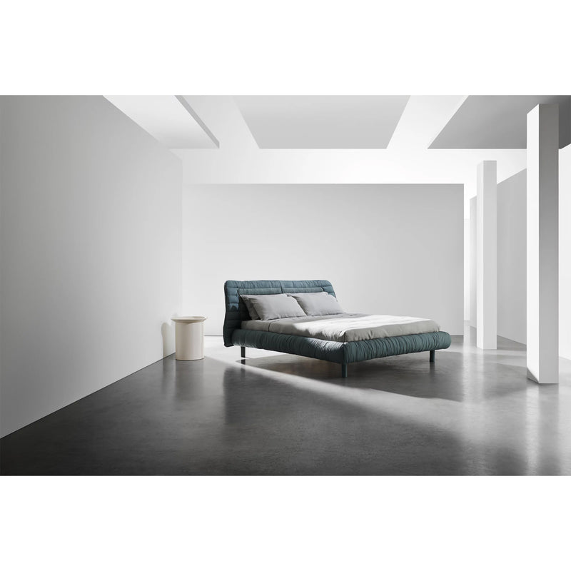 Gervasoni Plumeau Bed. Pictured with side table. Upholstered Bed Frames and Headboards USA.