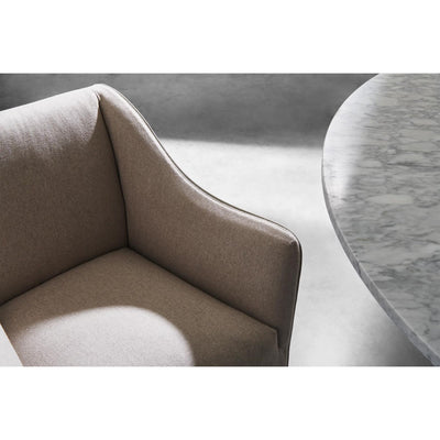 Gervasoni Saia 25 Armchair close up. Pictured with Gervasoni Grey 38 Round Table with marble top. Chairs USA.