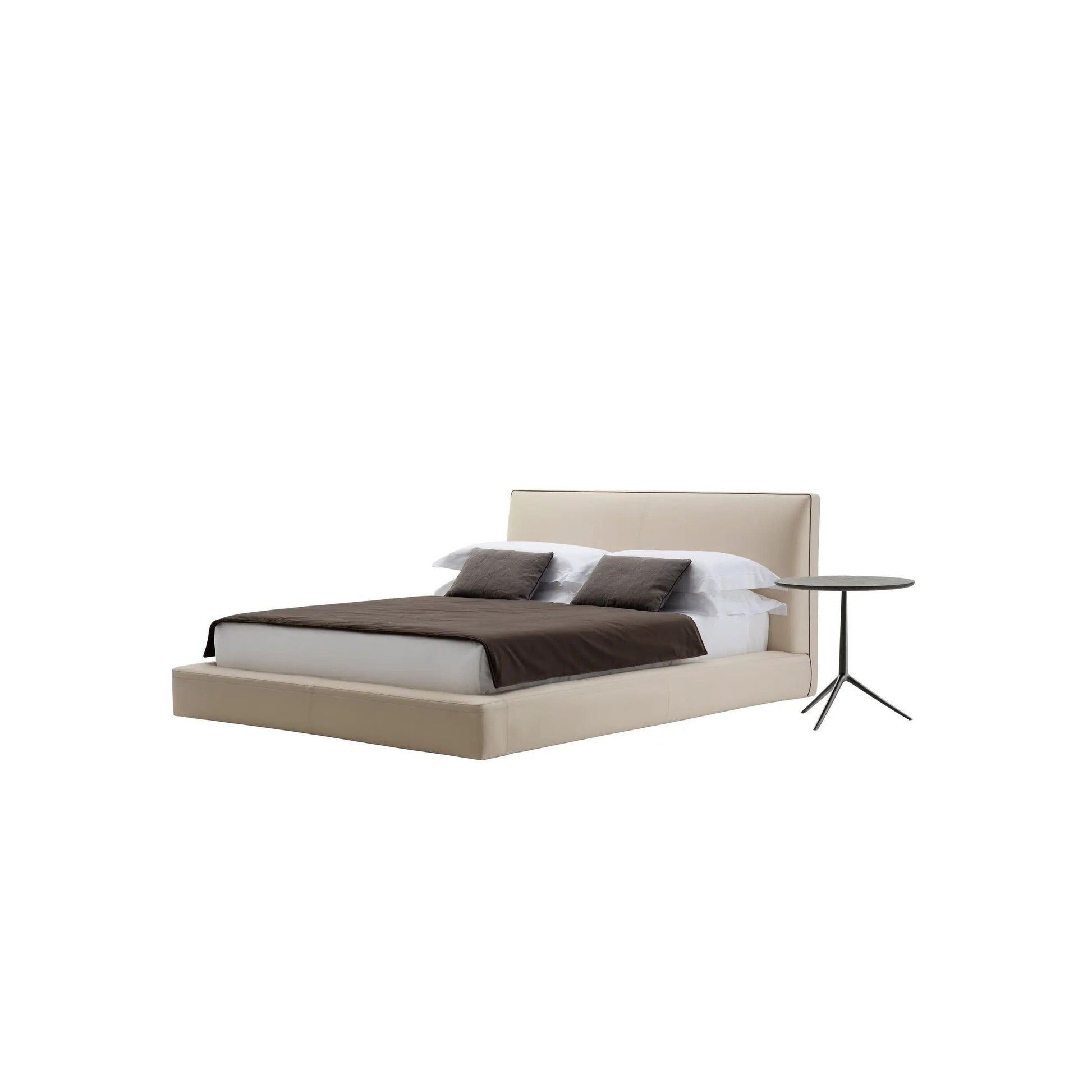Richard Bed by B&B Italia, product cutout on white background with a modern tripod side table.