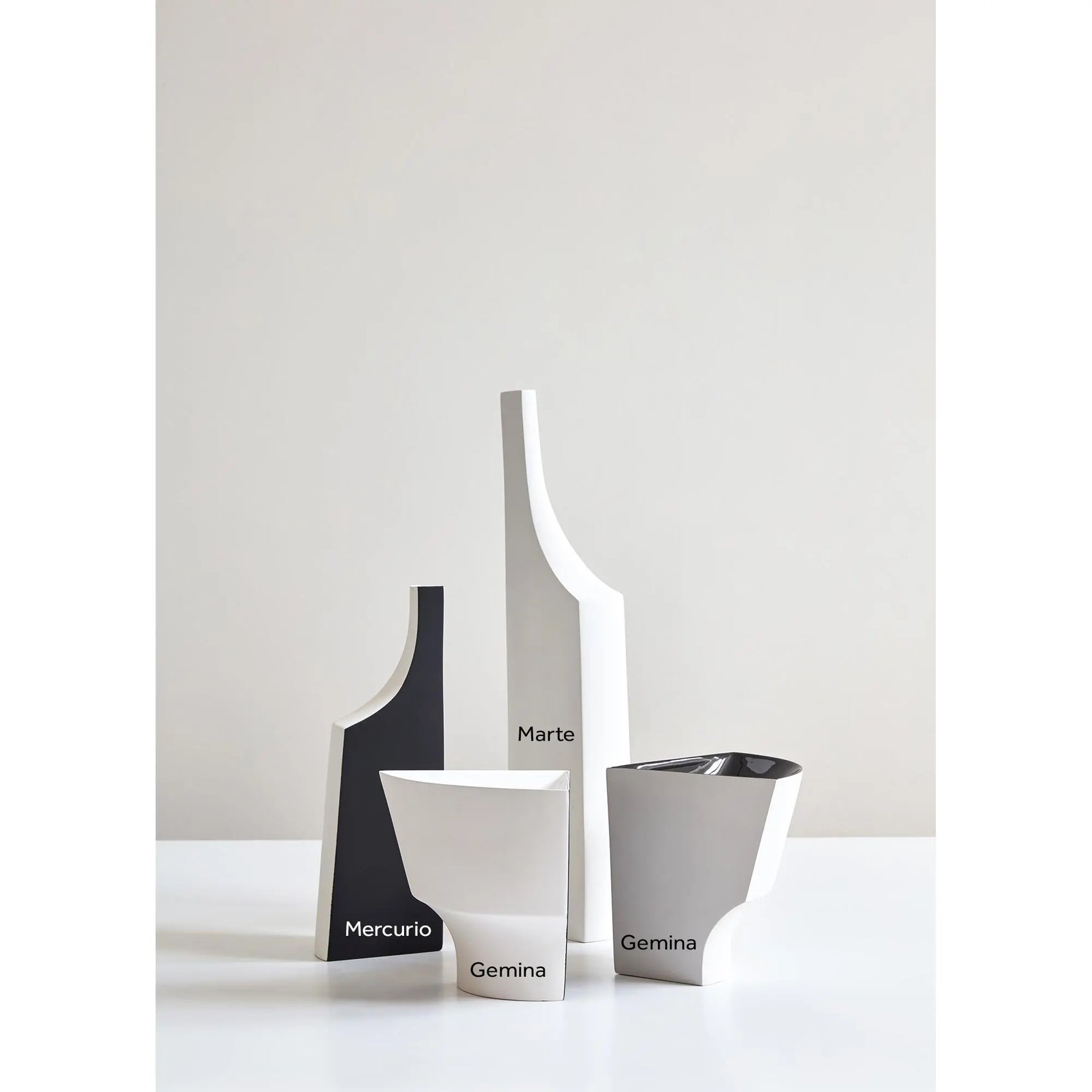 JANGEORGe Interiors & Furniture Kose Milano Mercurio Clay Bottle in Group Setting